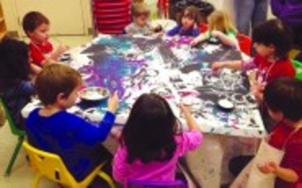 An Early Childhood Center art class at work.